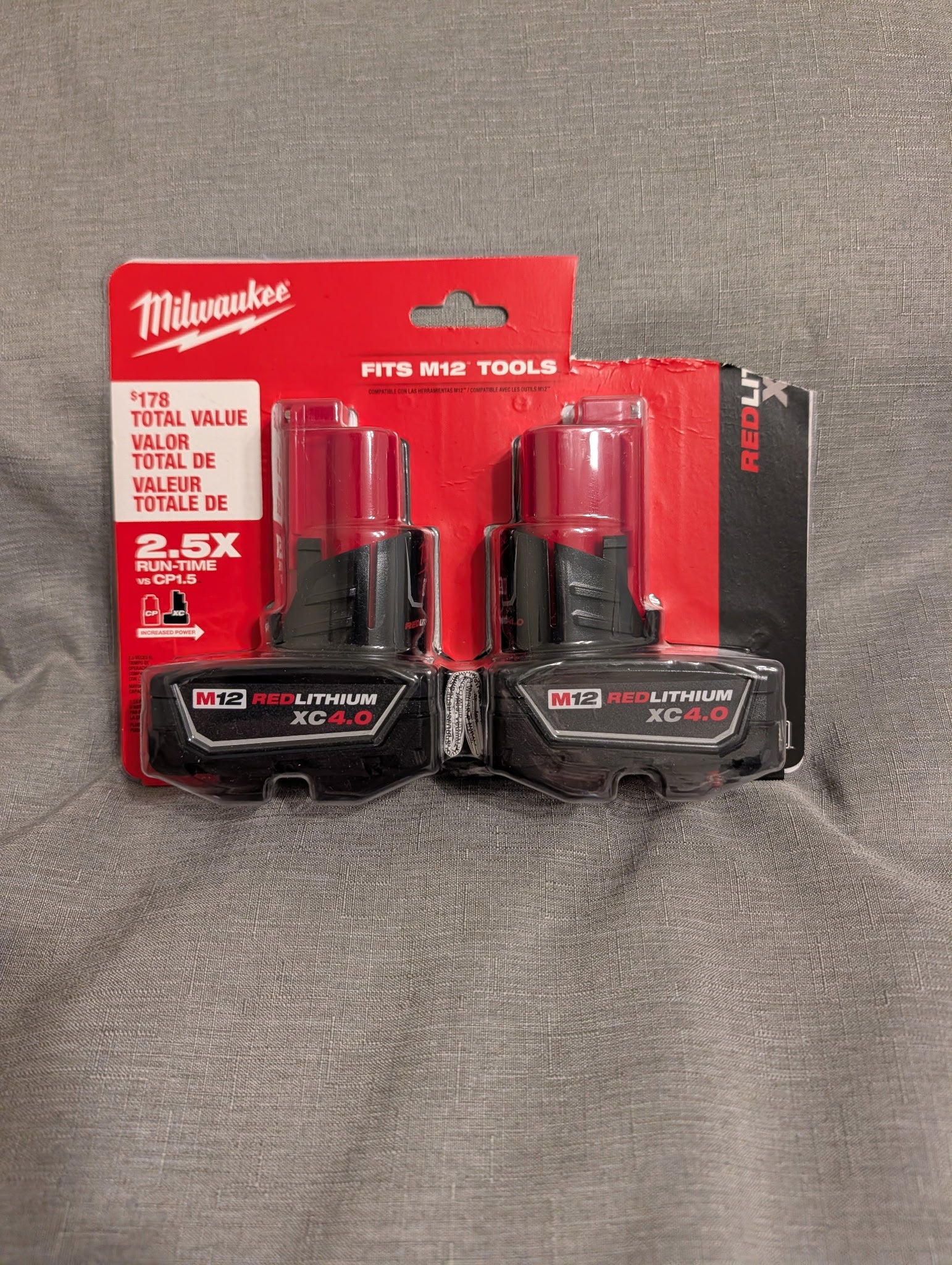 TWO MILWAUKEE LITHIUM BATTERERIES AND CHARGERS