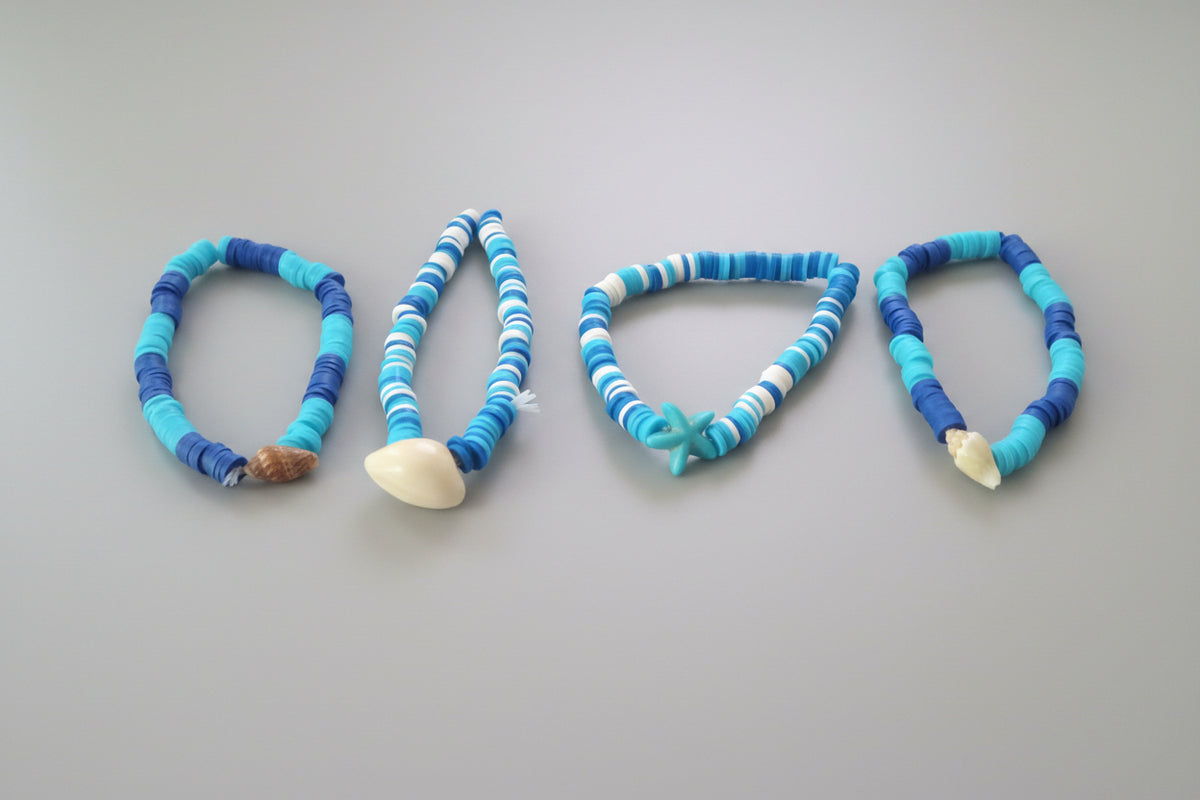 FOUR SEA SHELL BRACLETS