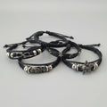 FIVE LEATHER BRACLETS ASSORTED