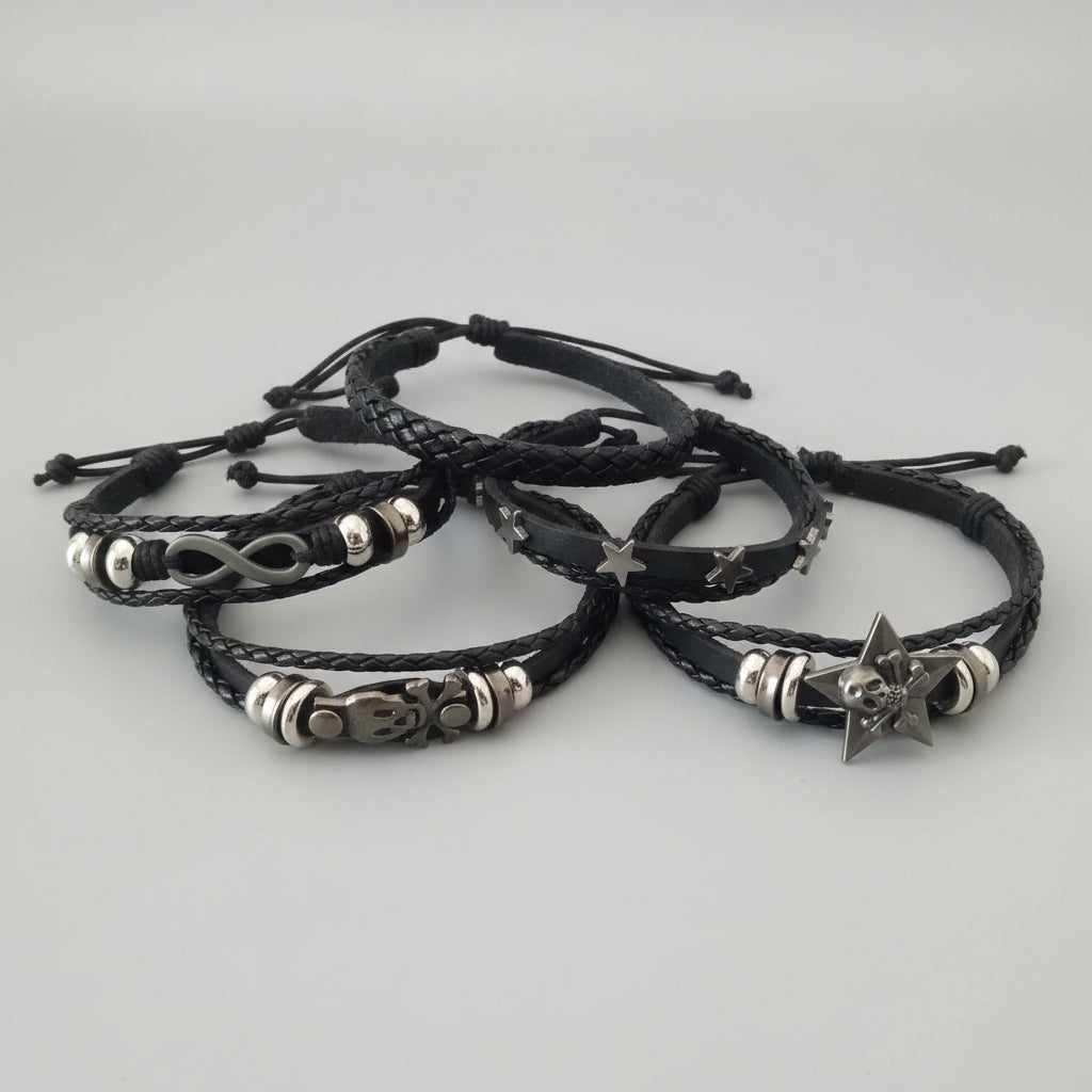 FIVE LEATHER BRACLETS ASSORTED